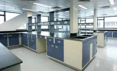 Rows of island benches with overhead reagent shelving